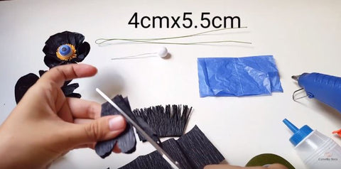 how-to-make-eyeball-paper-flowers-for-halloween-decoration-from-crepe-paper-3